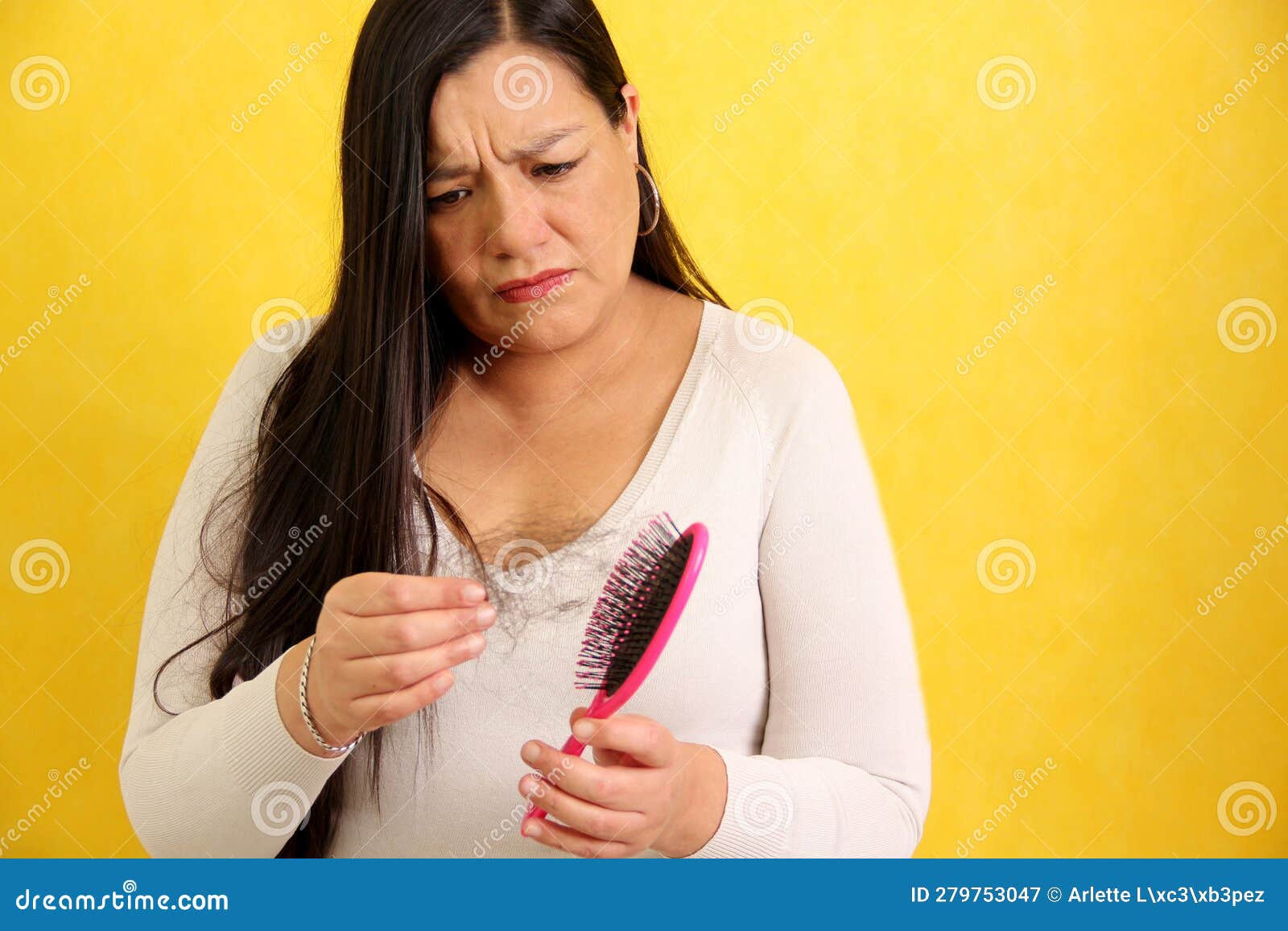 Adult Latina Woman Suffers from Hair Loss when Brushing it, a Symptom ...