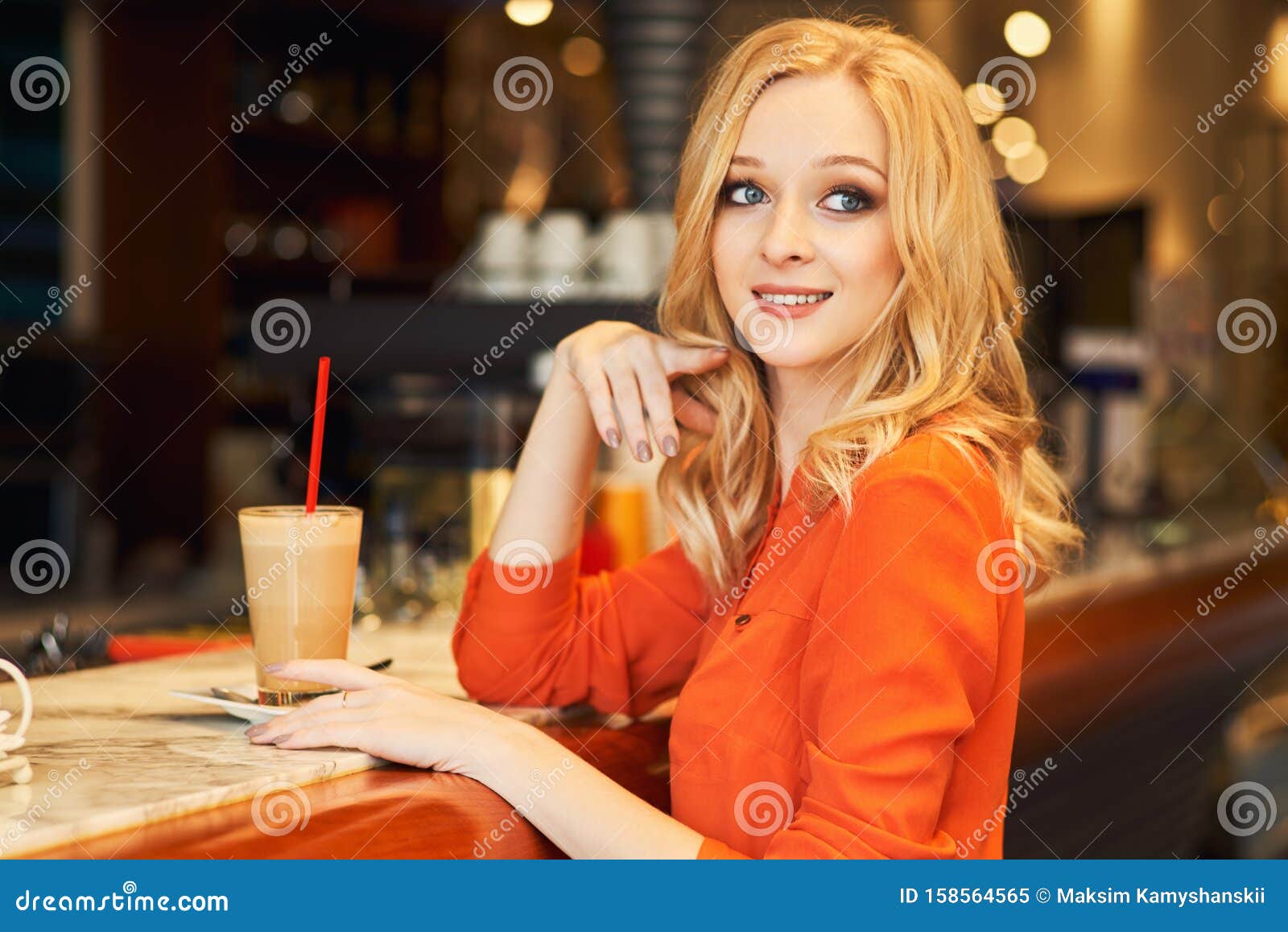 Adult Sitting At Bar Holding A Straw At The Drink Stock Image Image Of Beauty Looking 158564565 