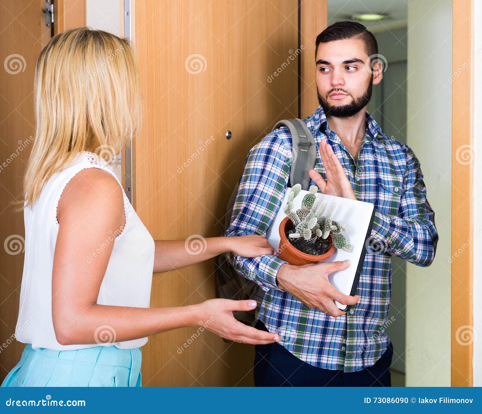Adult Watching How Spouse Moving Out with Baggage Stock Photo Image