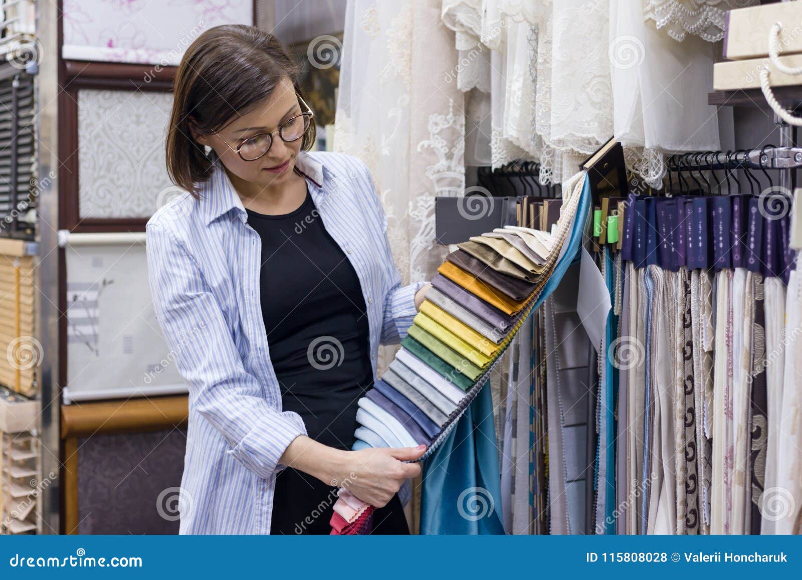 Adult Woman Chooses Fabrics Stock Photo - Image of hanger, material ...