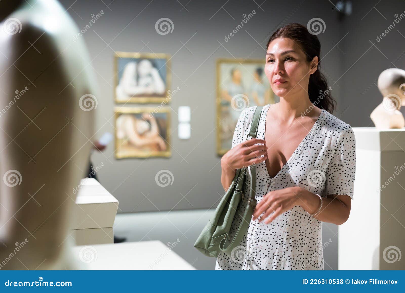 Adult woman in museum stock photo. Image of figurine - 226310538