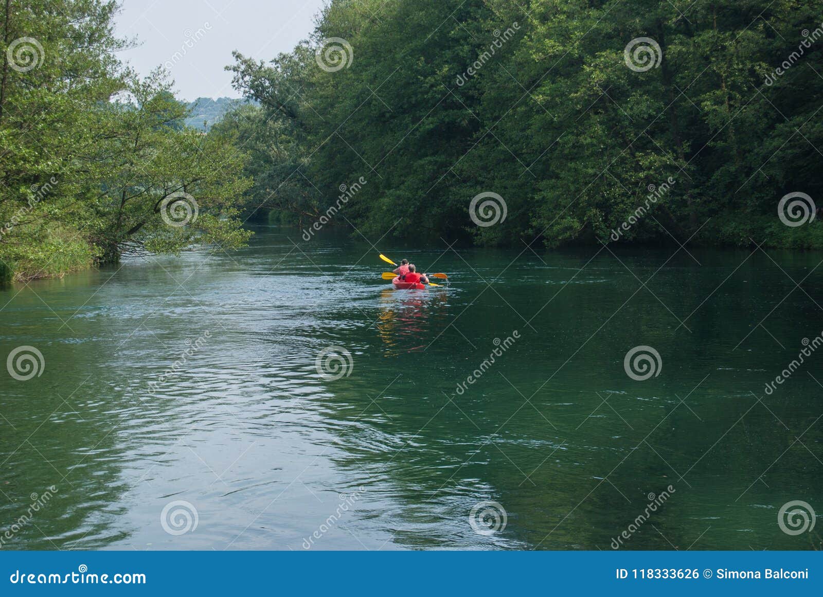 Two people on canoe stock photo. Image of adda, dangerous - 118333626