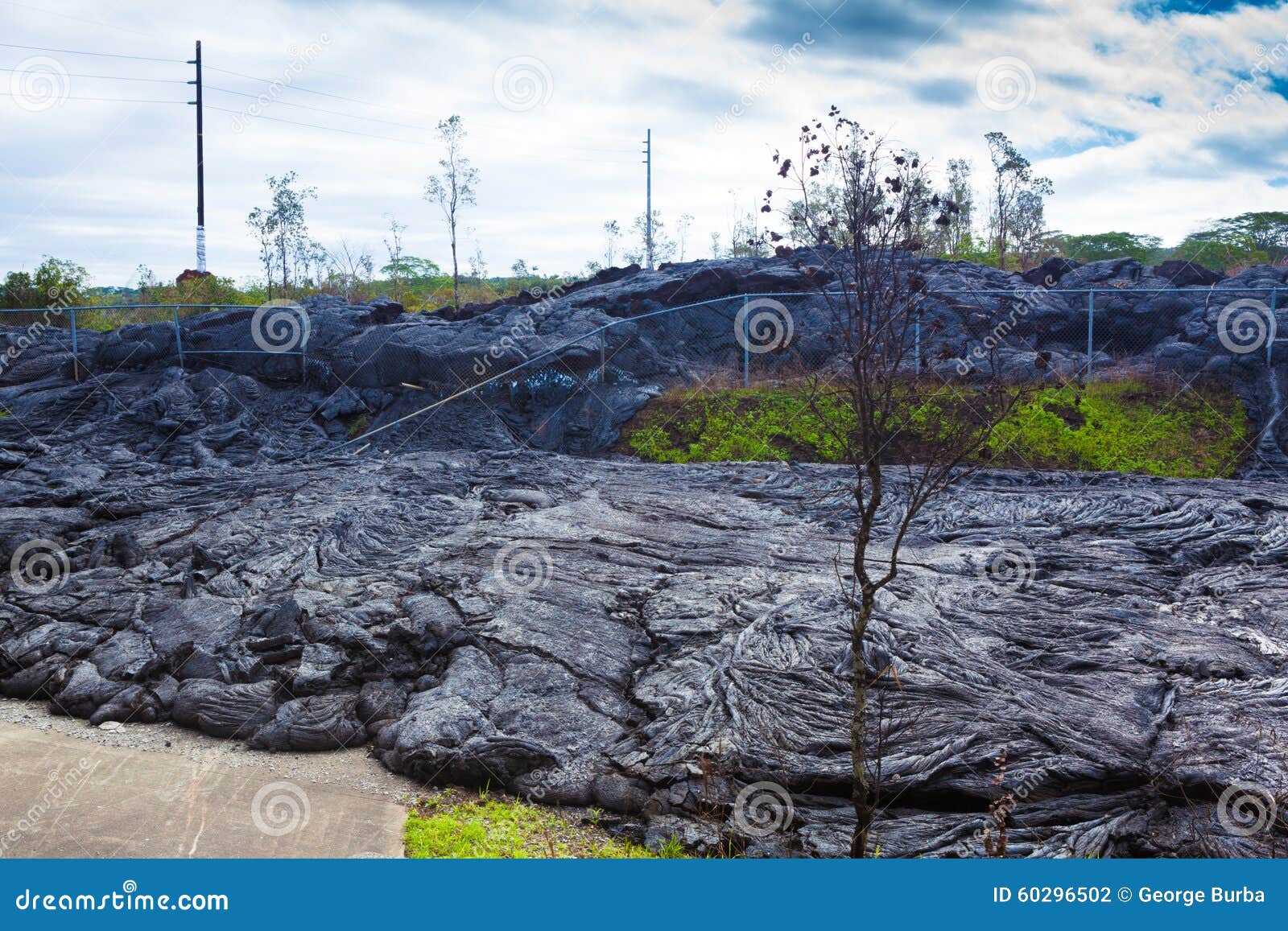 Advancing lava in town stock photo. Image of eroded, environment - 60296502