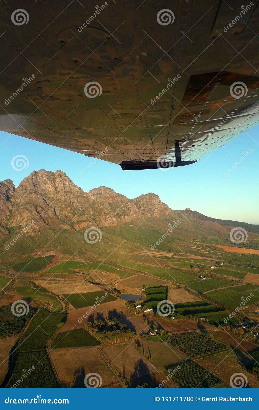 the swartberg mountain range under a wing