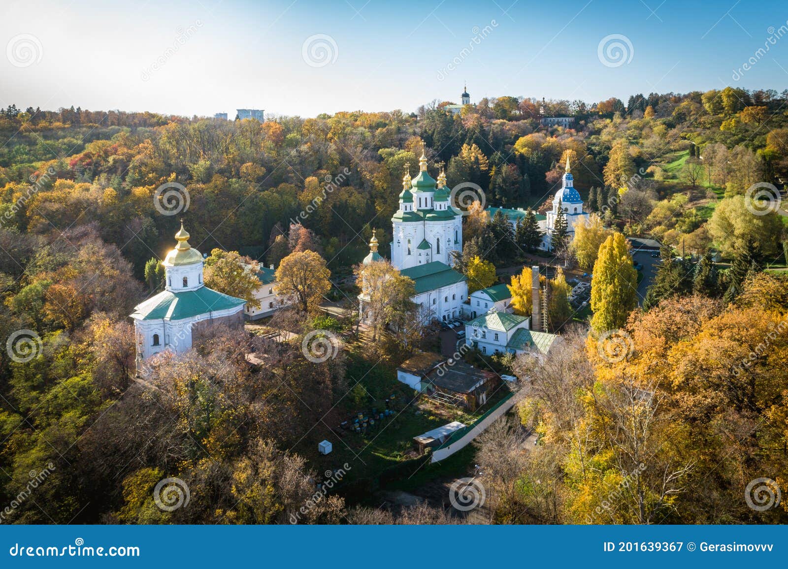 aerial autumn sunny view of vydubytskyi monastery in kyiv