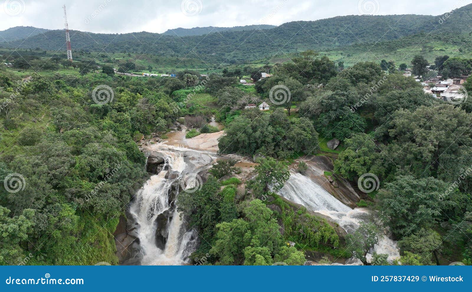 aerial city view of assop falls in jos, nigeria from high above