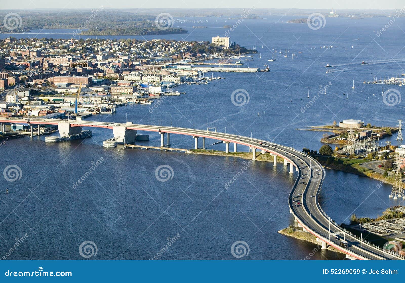 aerial of downtown portland, maine showing maine medical center, commercial street, old port, back bay and the casco bay bridge fr