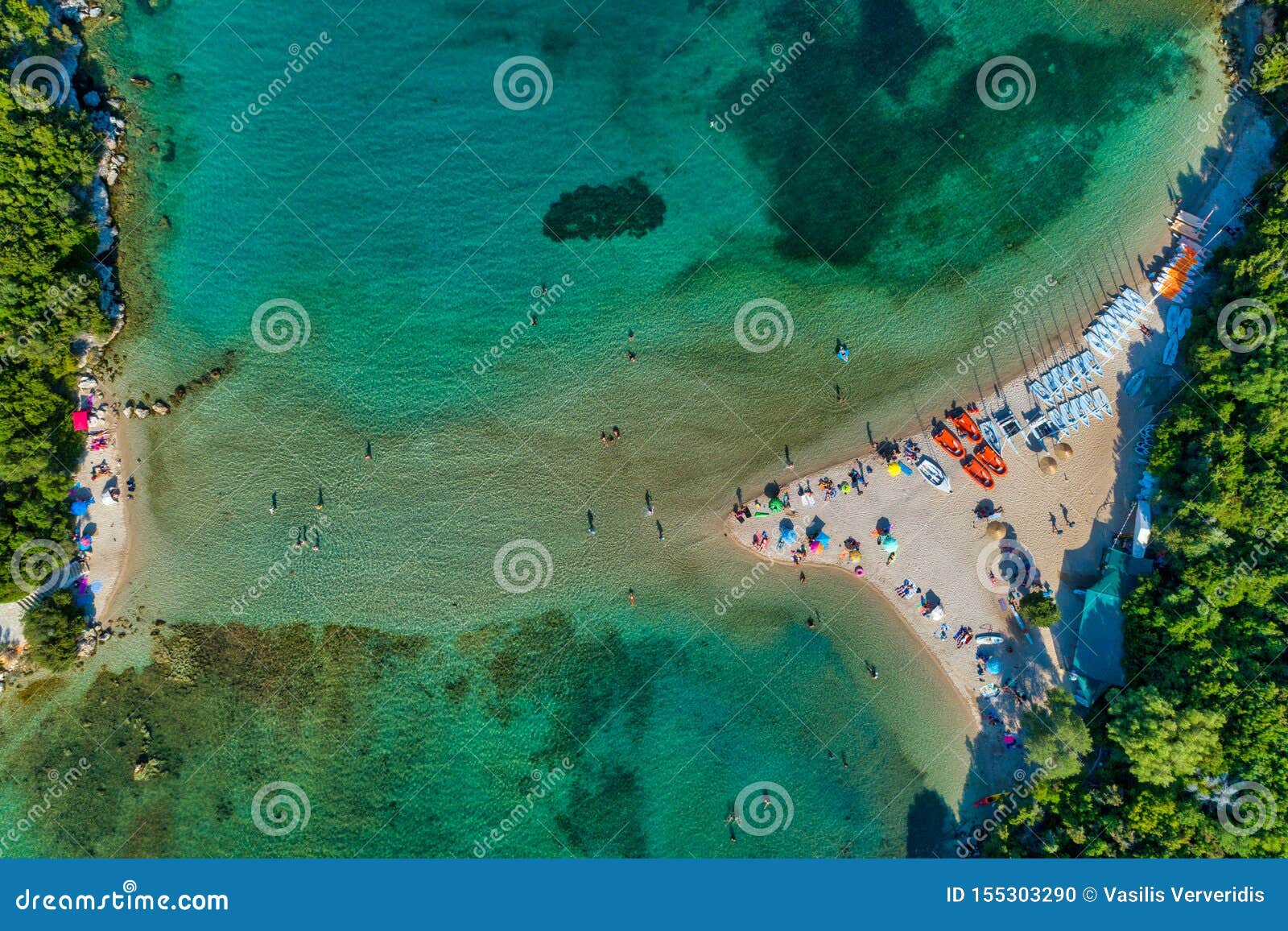 aerial drone bird`s eye view of bella vraka beach with turquoise sea in complex islands in sivota area, ionian sea, epirus, greec