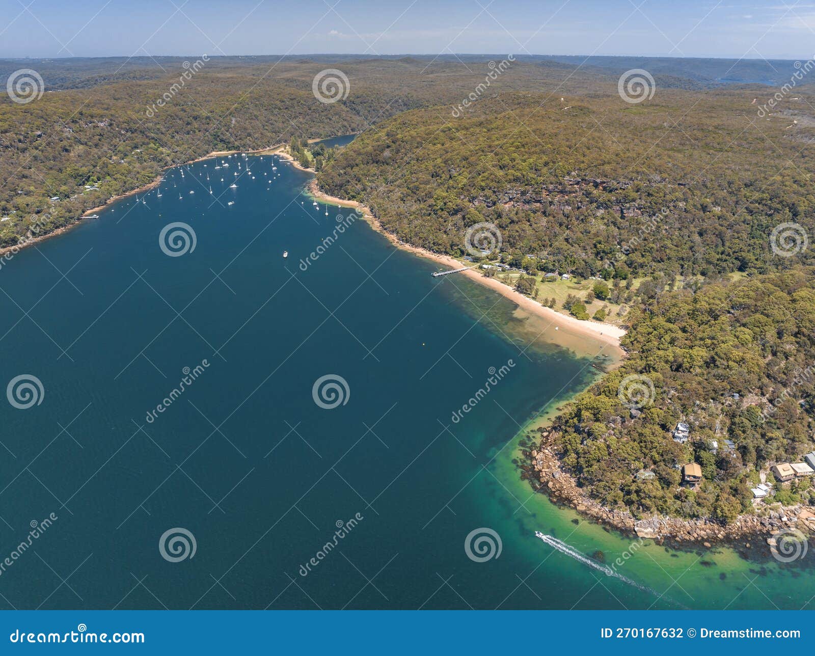 aerial drone view of currawong beach and the basin