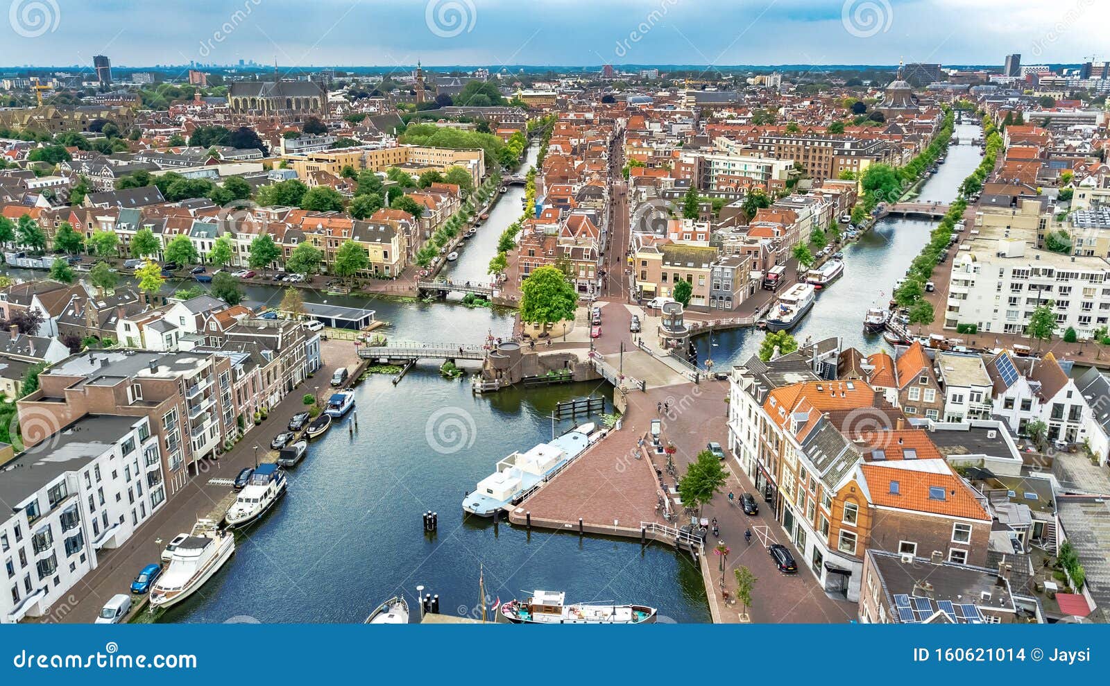 aerial drone view of leiden town cityscape from above, typical dutch city skyline with canals and houses, holland, netherlands