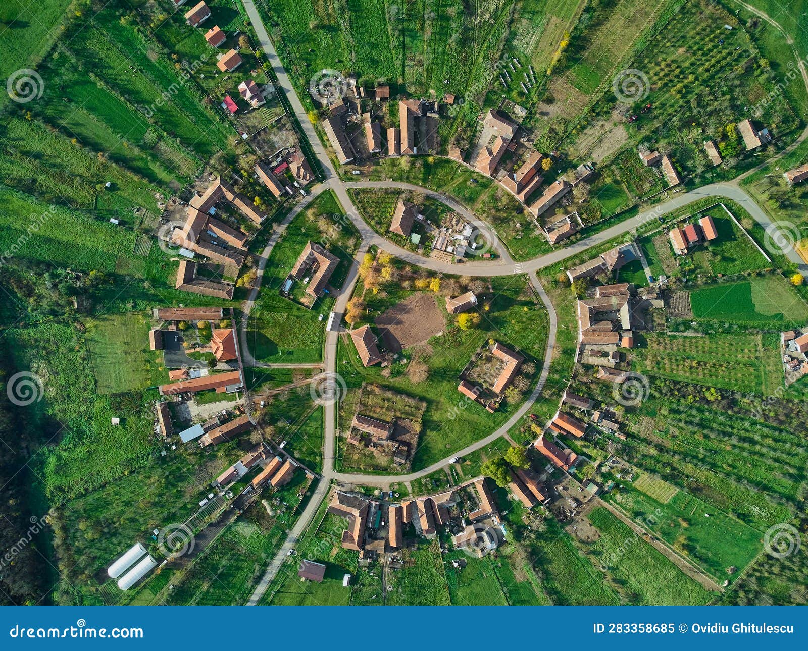 aerial drone view over the round village of charlottenburg, timis, romania