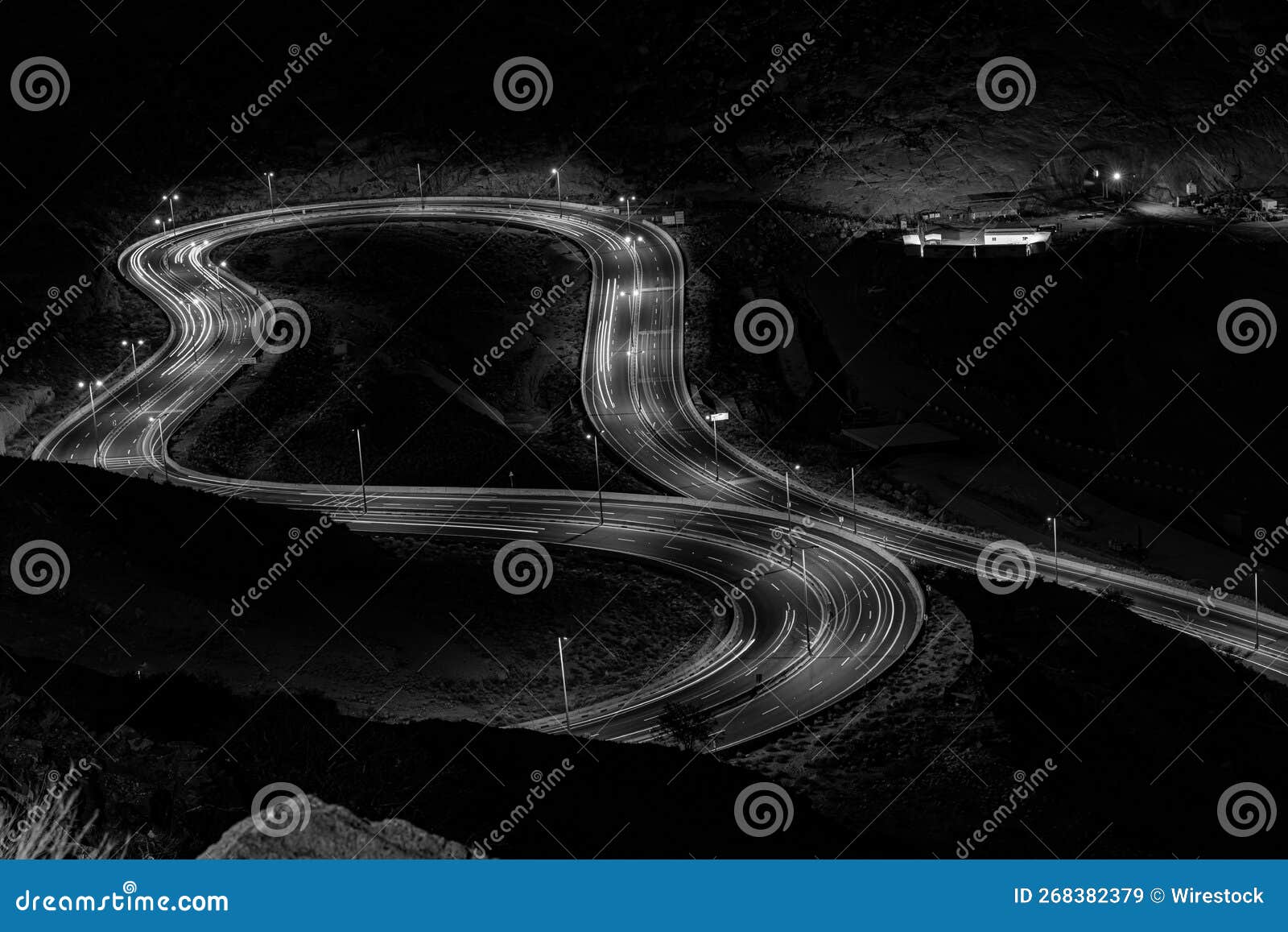 aerial greyscale night view of the al-hada road taif