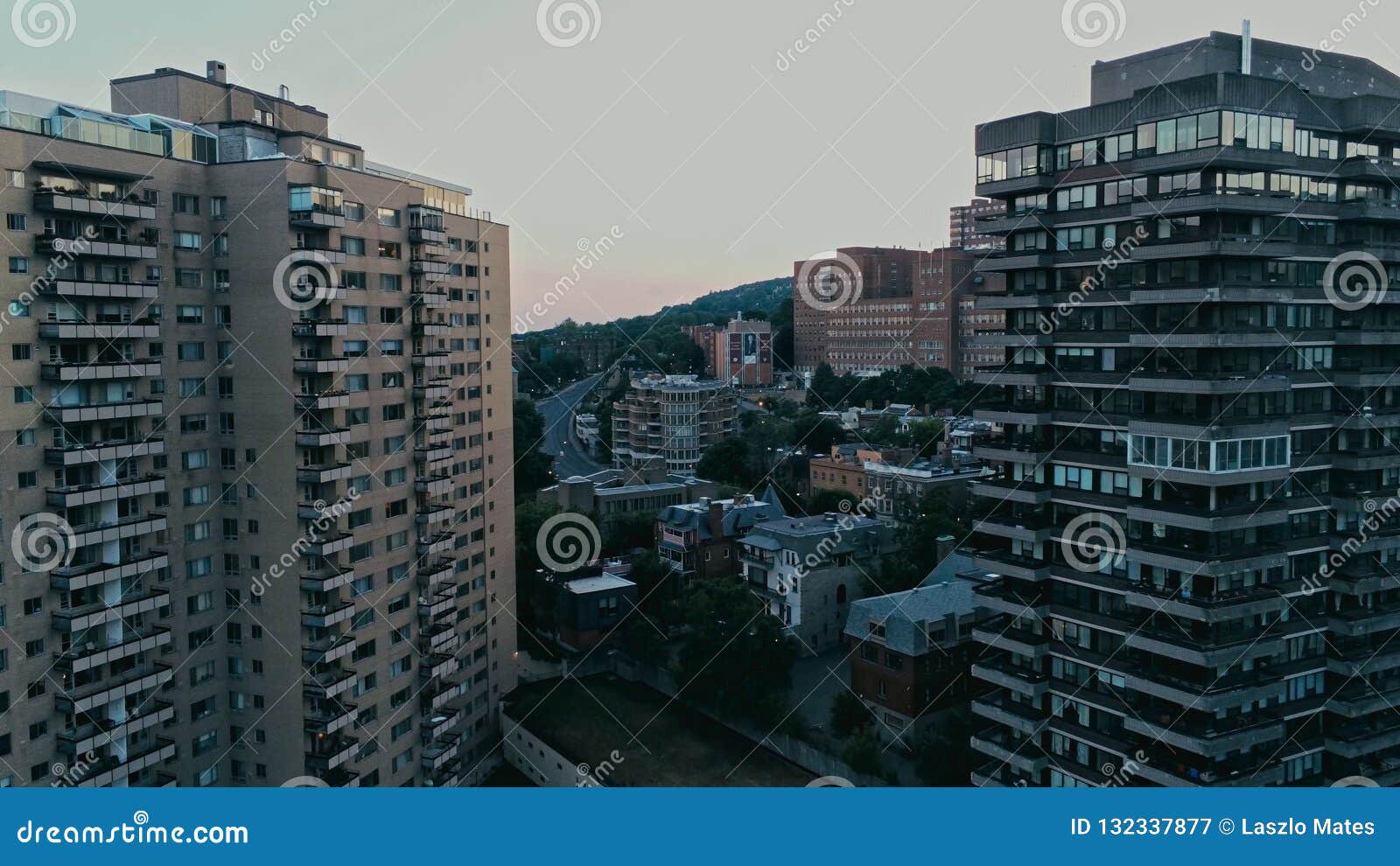 aerial image of rundown highrises during a hazy summer day