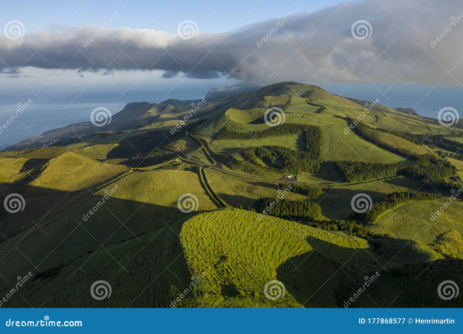 aerial image showing the volcanic mountains of the san jorge island in the azores, near pico de la esperanza