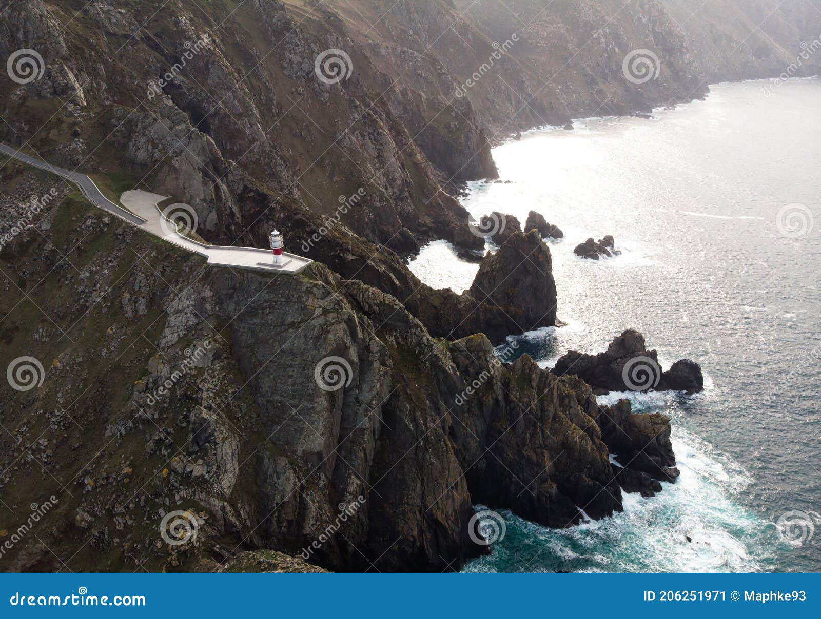 aerial panorama of cabo ortegal lighthouse on steep rocky cliff atlantic ocean bay of biscay carino cape galicia spain