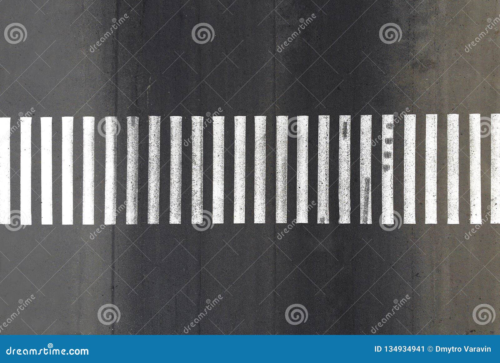 aerial. pedestrian crosswalk zebra with no pedestrians.