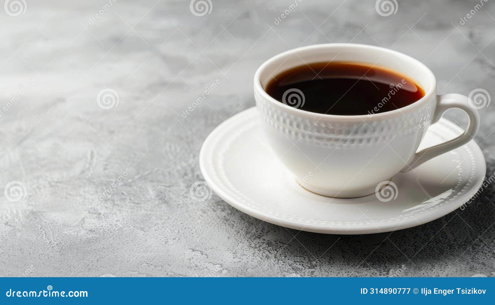 aerial perspective of a coffee cup on a tabletop offering extensive area for custom text