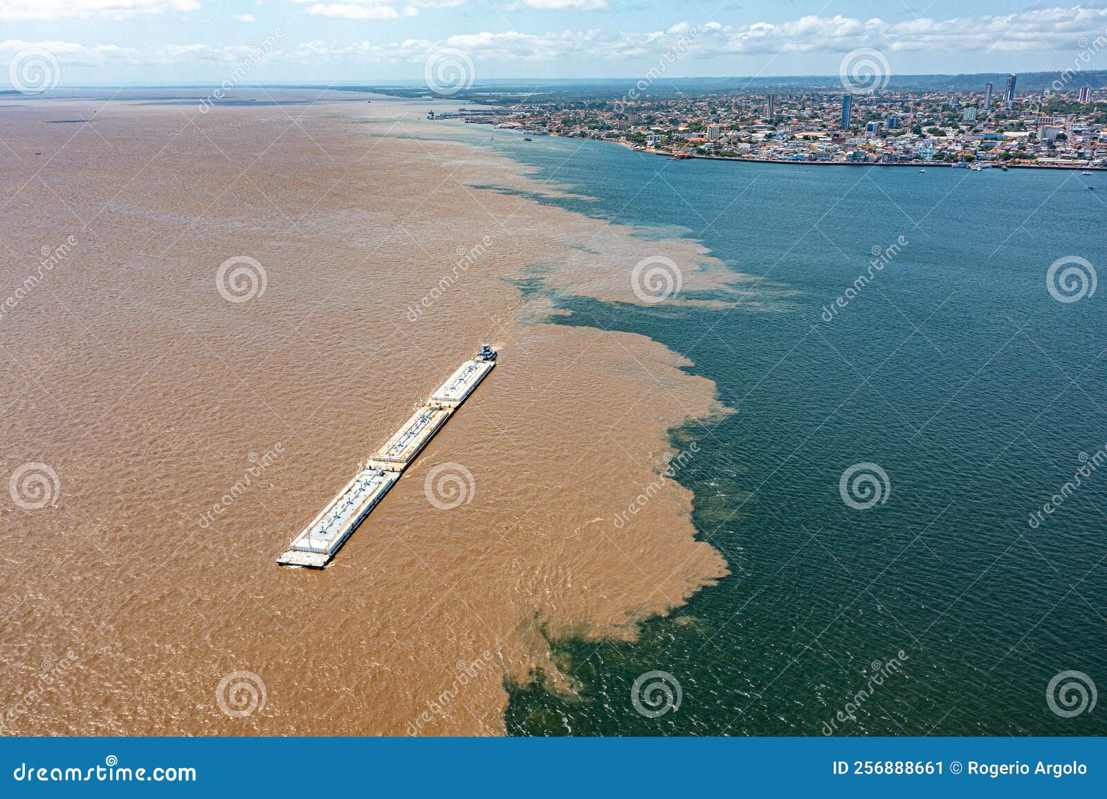 aerial photo of satarÃÂ©m city and the meeting of the waters of the amazon rivers with the tapajÃÂ³s river in parÃÂ¡, brazil.