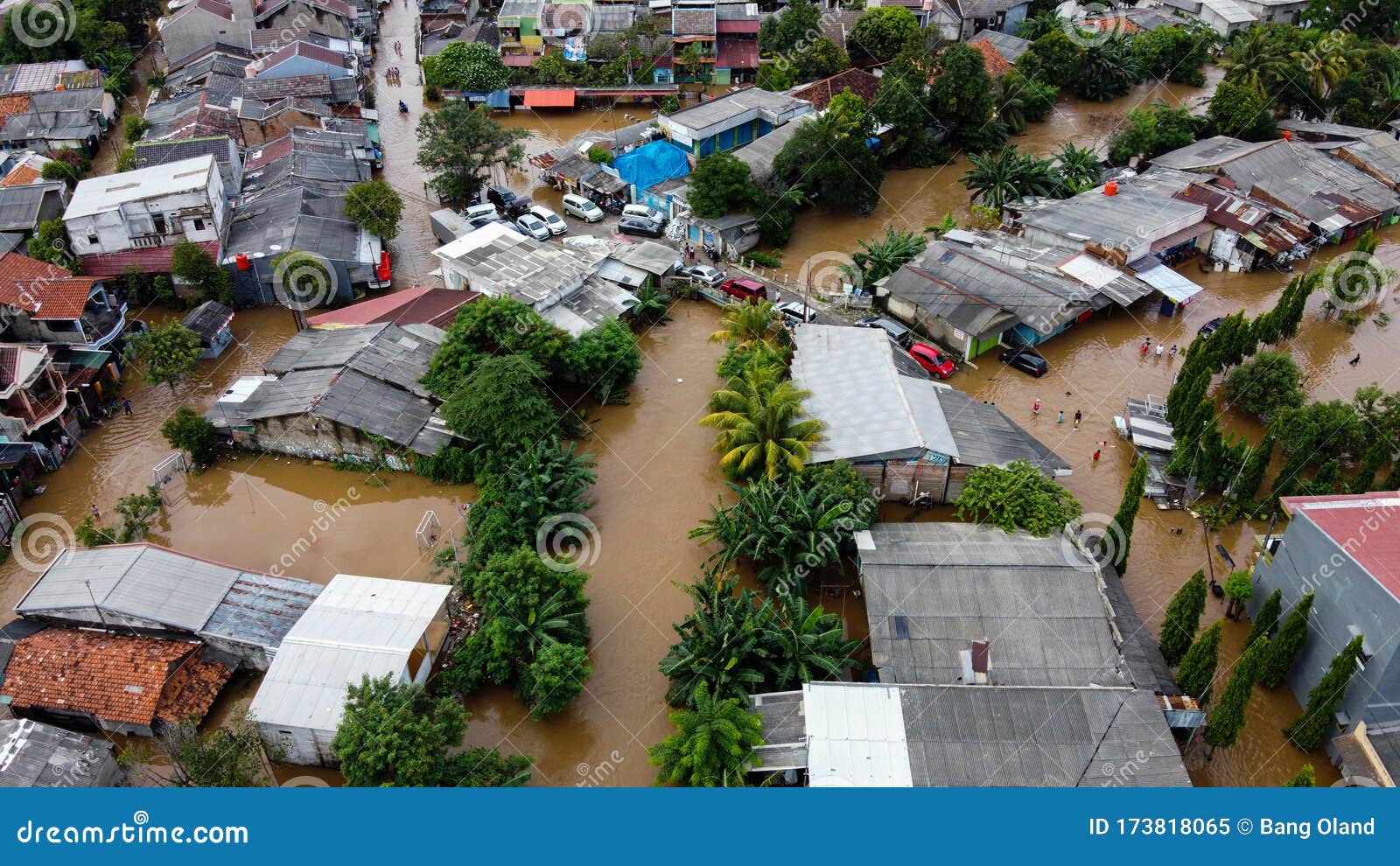 aerial pov view depiction of flooding. devastation wrought after massive natural disasters at bekasi - indonesia