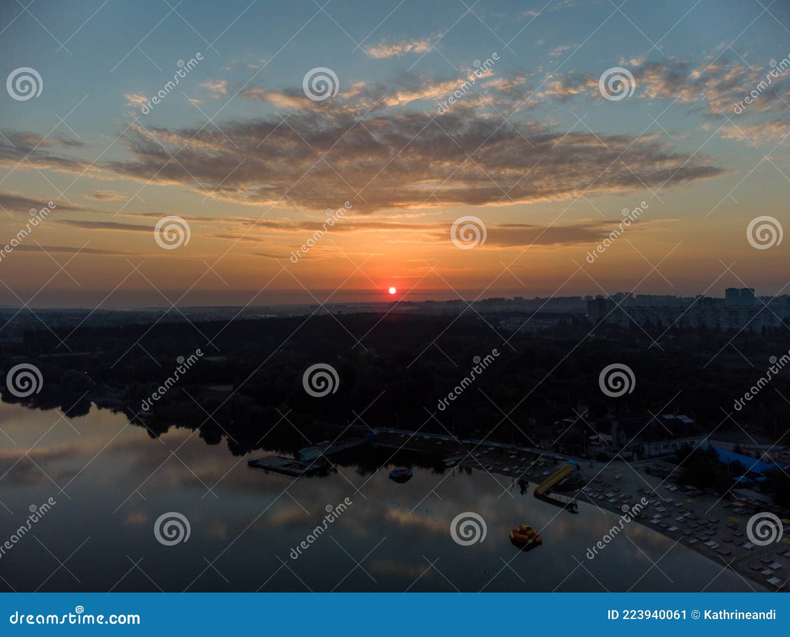 aerial scenic sunrise with clouds on wide river