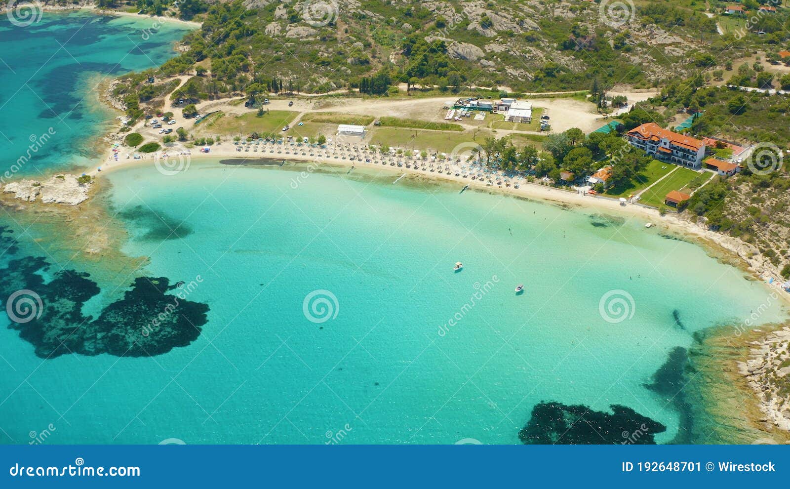aerial shot of a beautiful landscape of the lagonisi beach in sithonia halkidiki, greece