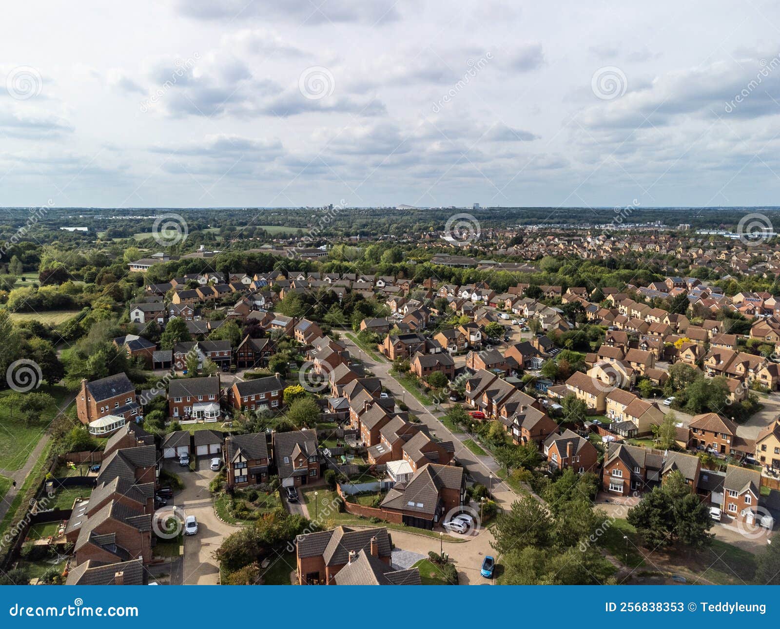 aerial shot looking down on urban housing development - housing estate of mainly bungalows in milton keynes. housing market, econo