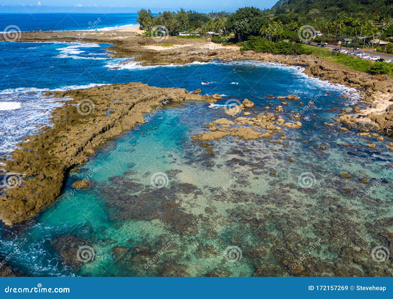 aerial shot of the rock pools for snorkeling at sharks cove hawaii