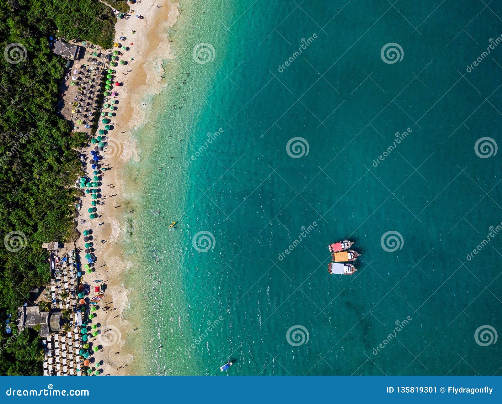 aerial top view from above to summer beach prainhas do pontal de atalaia in arraial do cabo in the brazilian state of