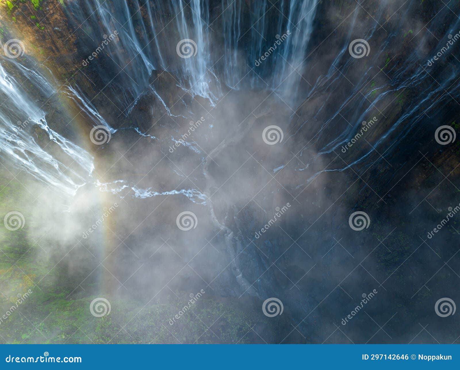aerial top view from above of tumpak sewu ,also known as coban sewu, 120m high waterfall in malang regency, east java, indonesia