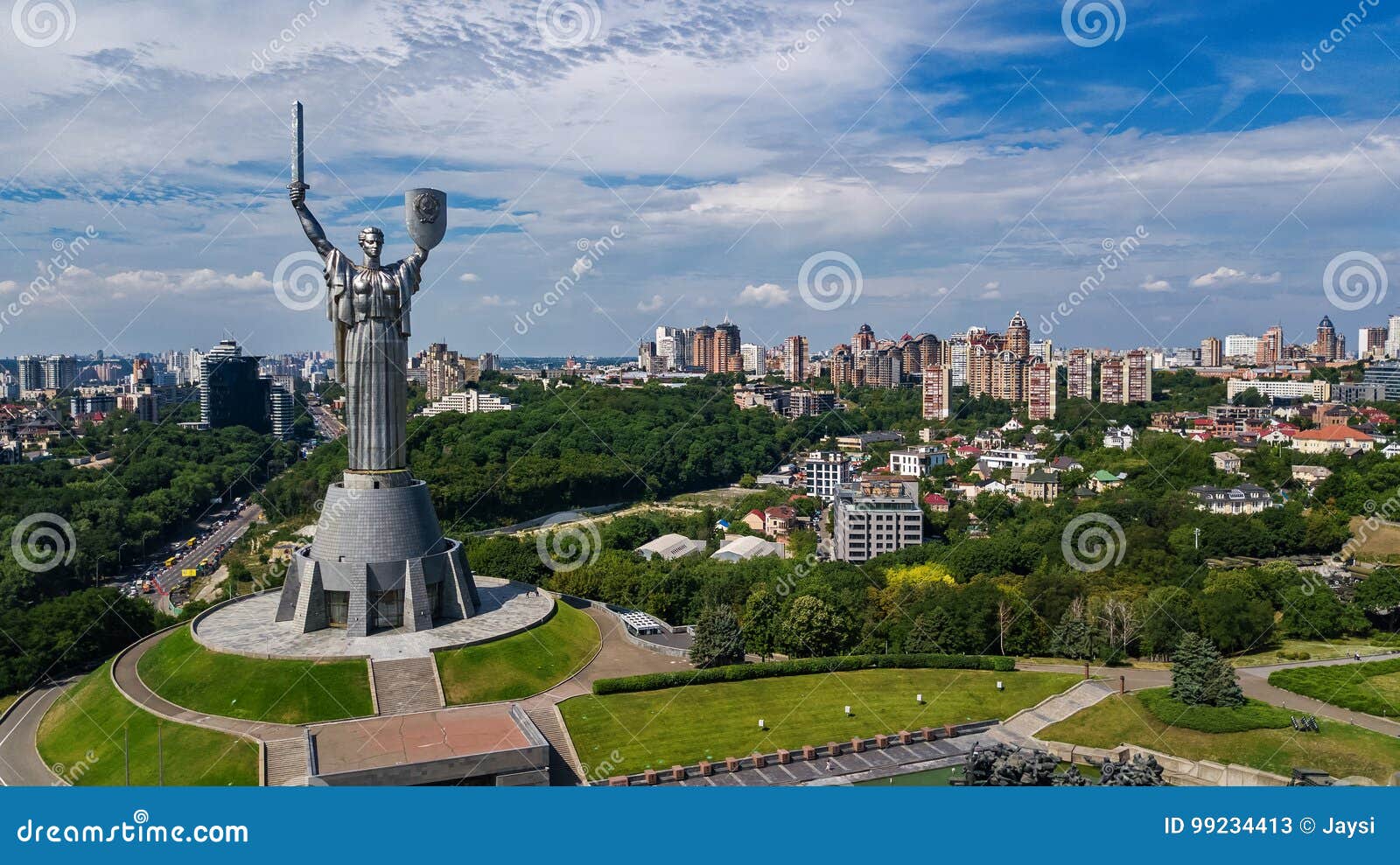 aerial top view of kiev motherland statue monument on hills from above and cityscape, kyiv, ukraine