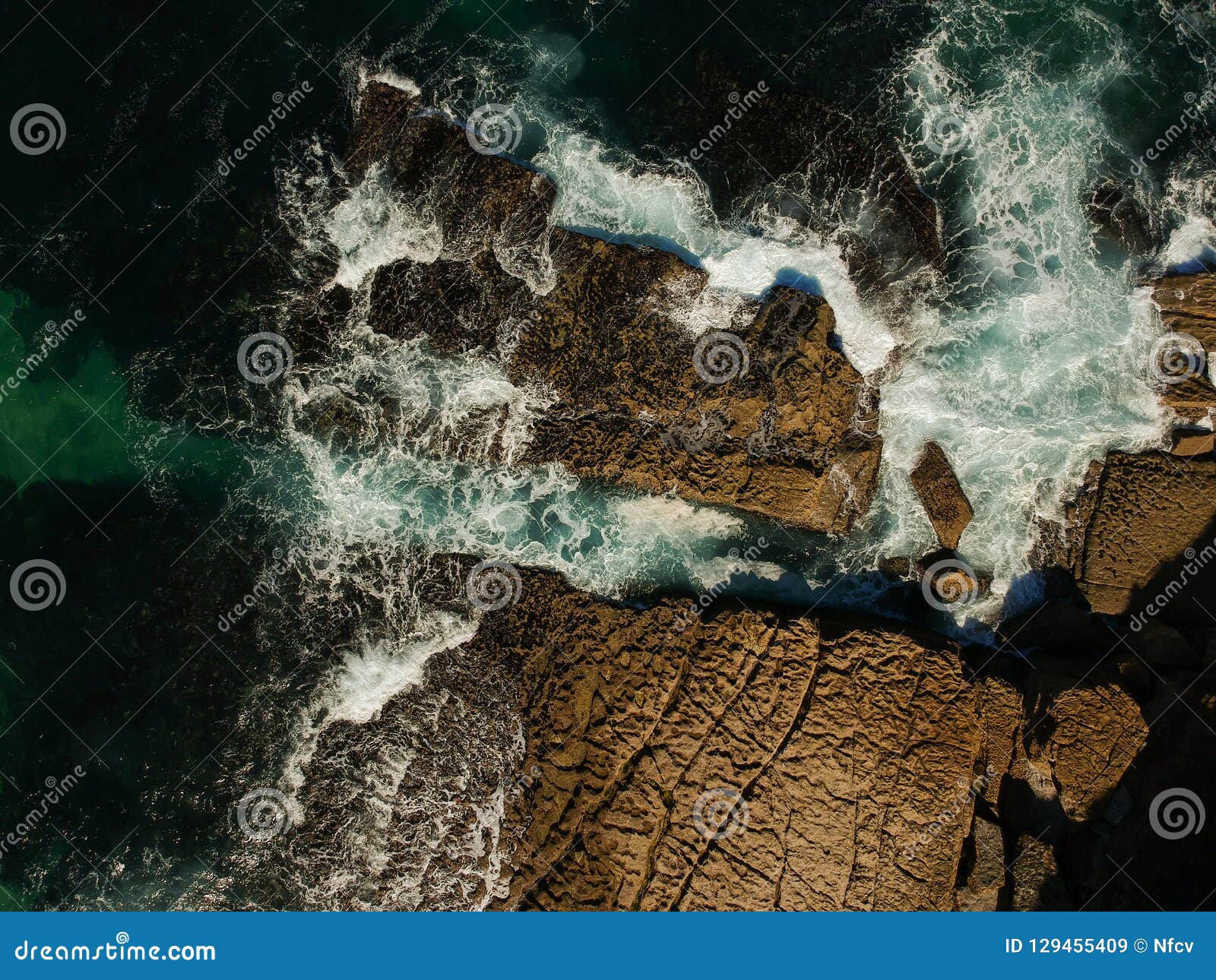 Aerial Top View of Sea Waves Hitting Rocks on the Beach with Turquoise ...