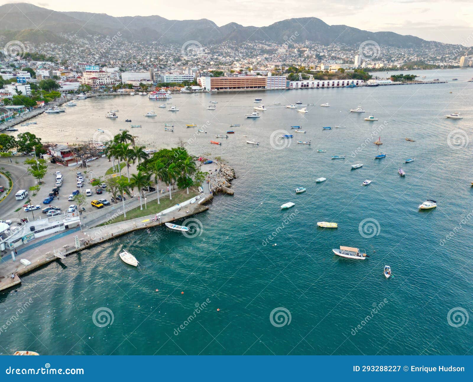 aerial view of acapulco: rotonda de los hombres ilustres and partial bay scenery