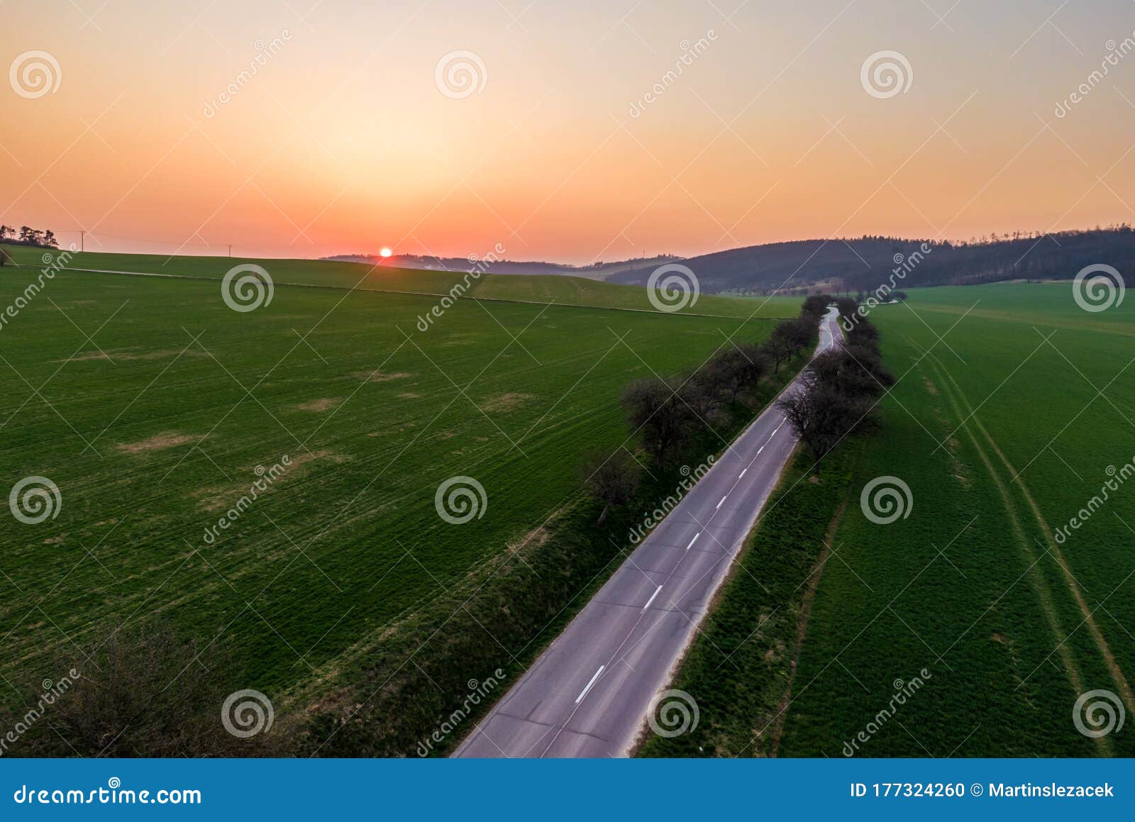 Aerial View Of Agriculture Land During Beautiful Sunset Fields And