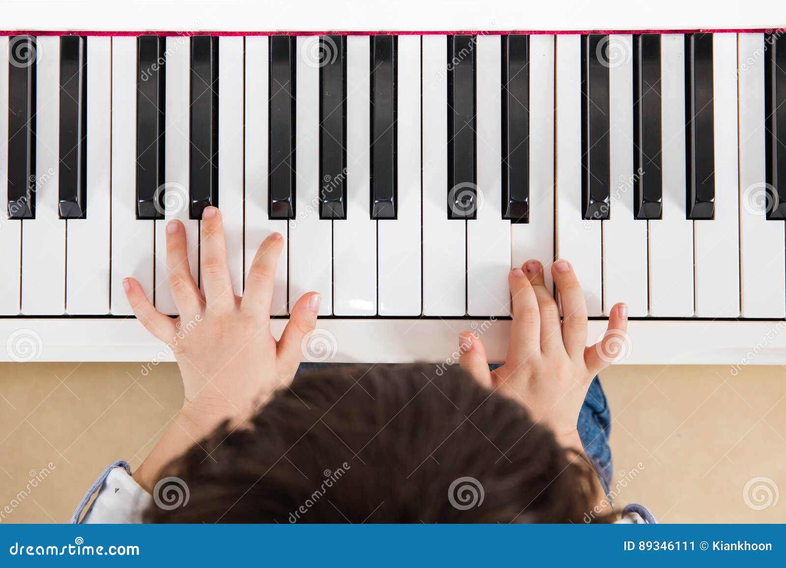 Aerial View of Asian Chinese Little Boy Playing Piano Stock Image