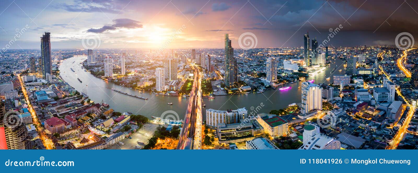 aerial view of bangkok skyline and skyscraper with light trails