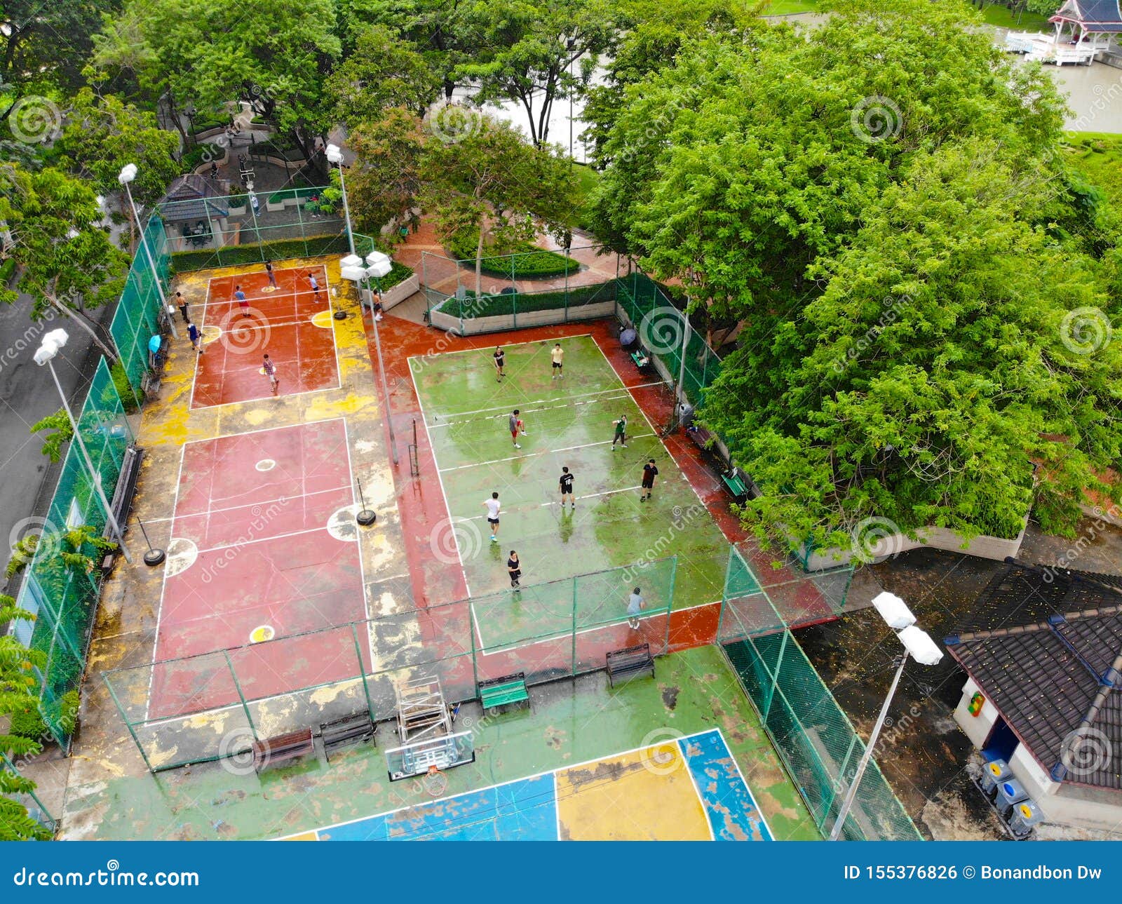Aerial View of Basketball Court with Players in Public Park in Bangkok