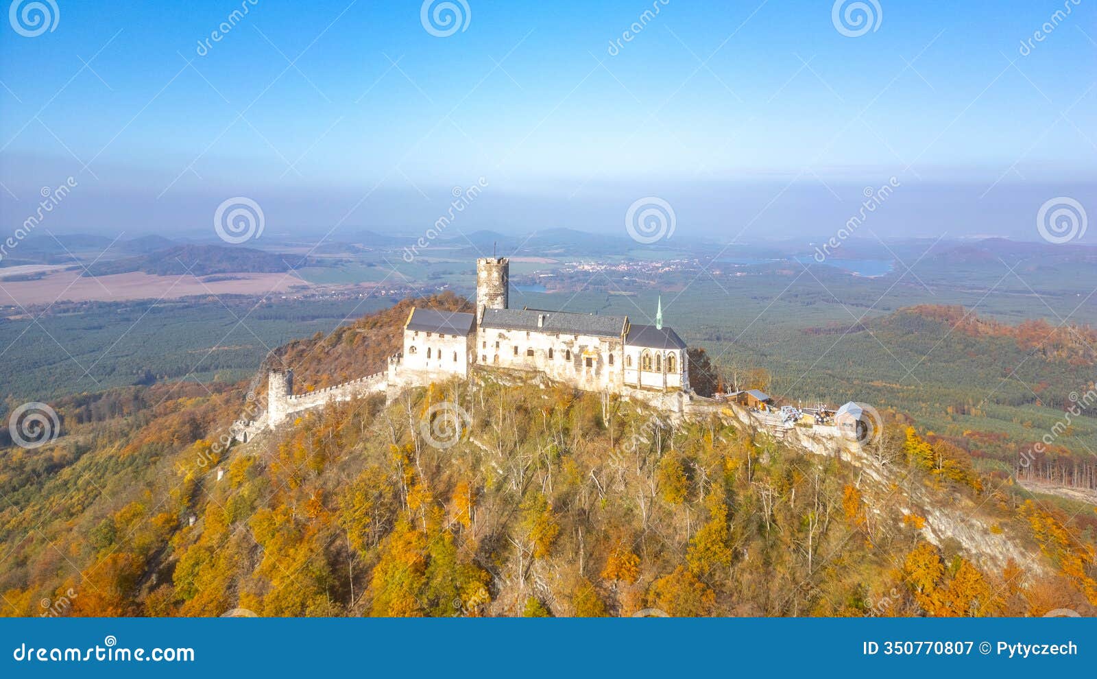 aerial view of bezdez castle in autumn foliage
