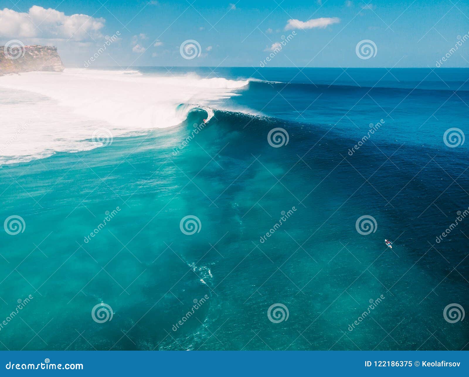 aerial view of big wave surfing in bali. big waves in ocean