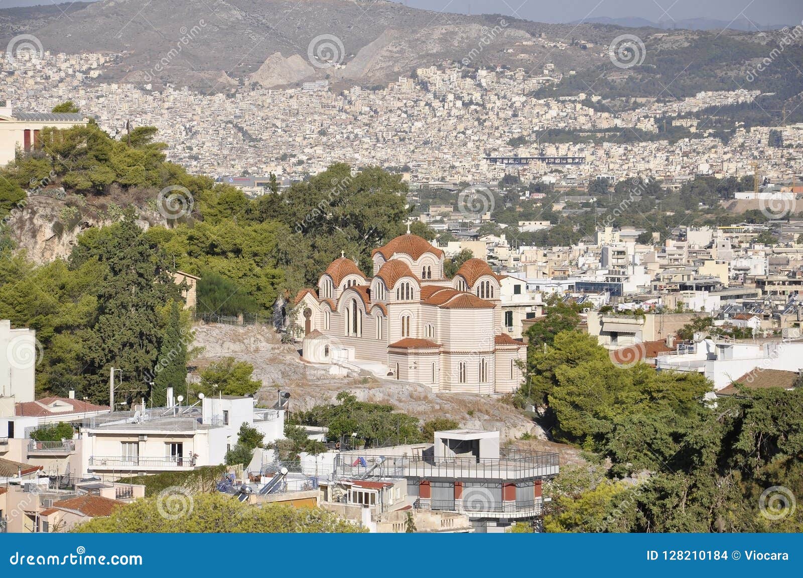 aerial view with byzantine cathedral of the holy trinity and telescope of national observatory from athens in greece