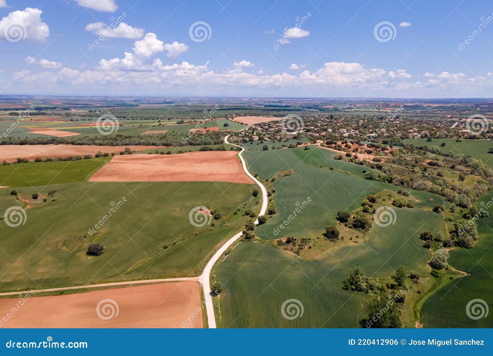 aerial view of a castilian countryside with country houses and plots of land