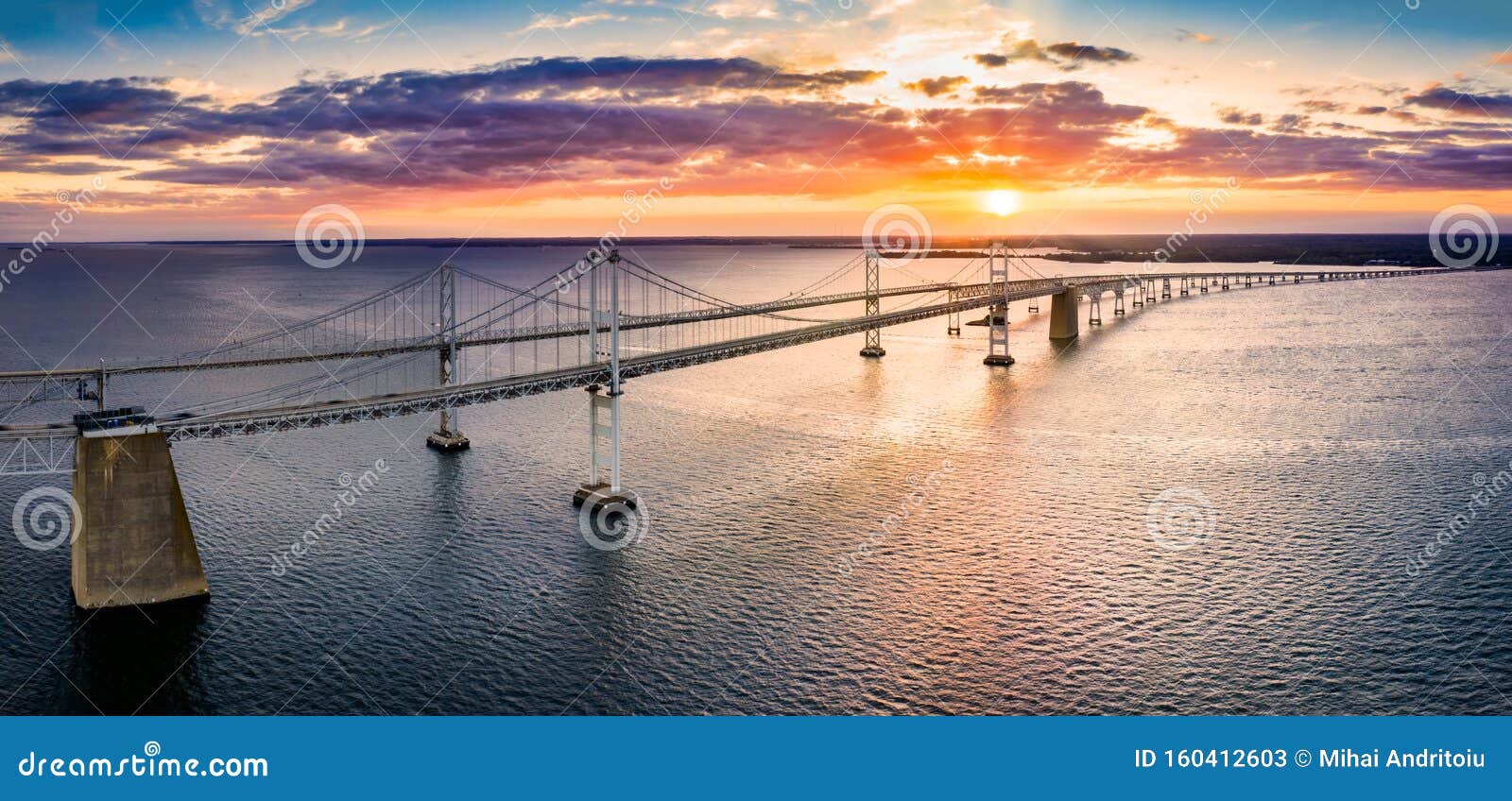 aerial view of chesapeake bay bridge at sunset.