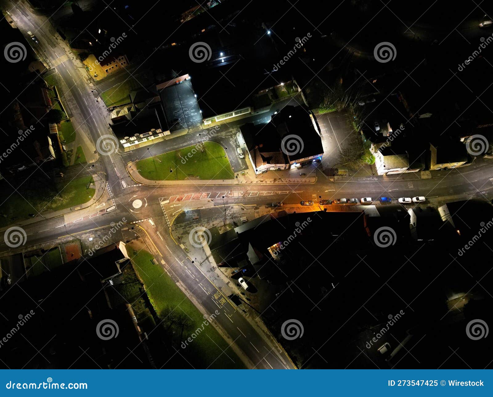 Aerial View of a Cityscape at Night with Streets Illuminated with ...