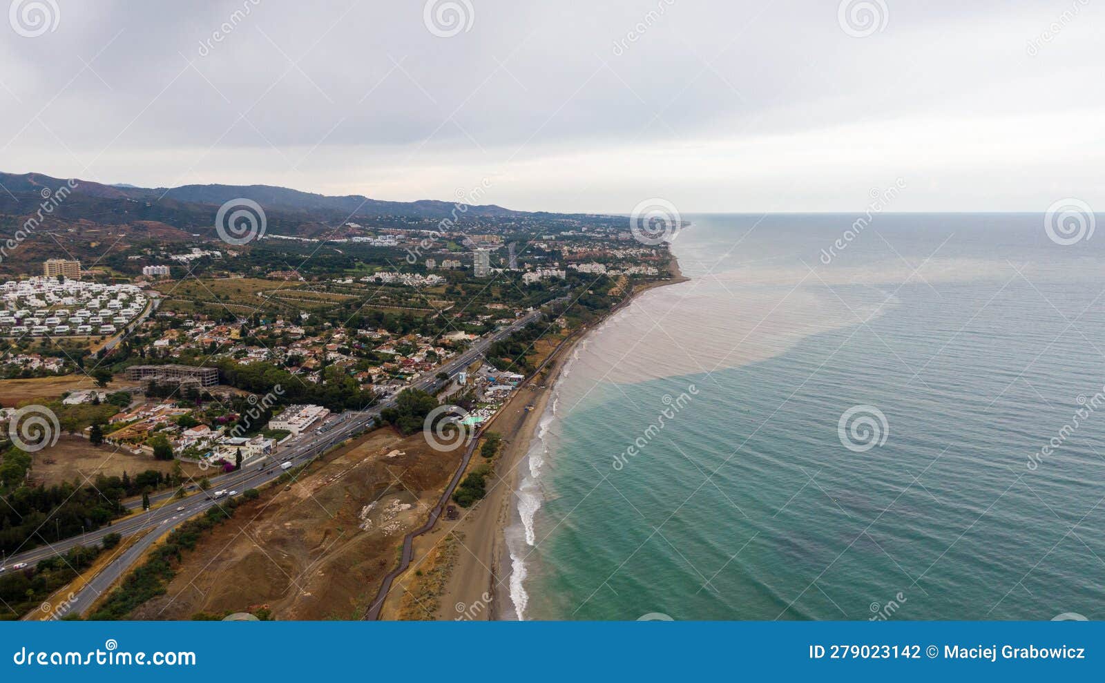 aerial view on coast of alboran sea, buildings and resorts in marbella, spain