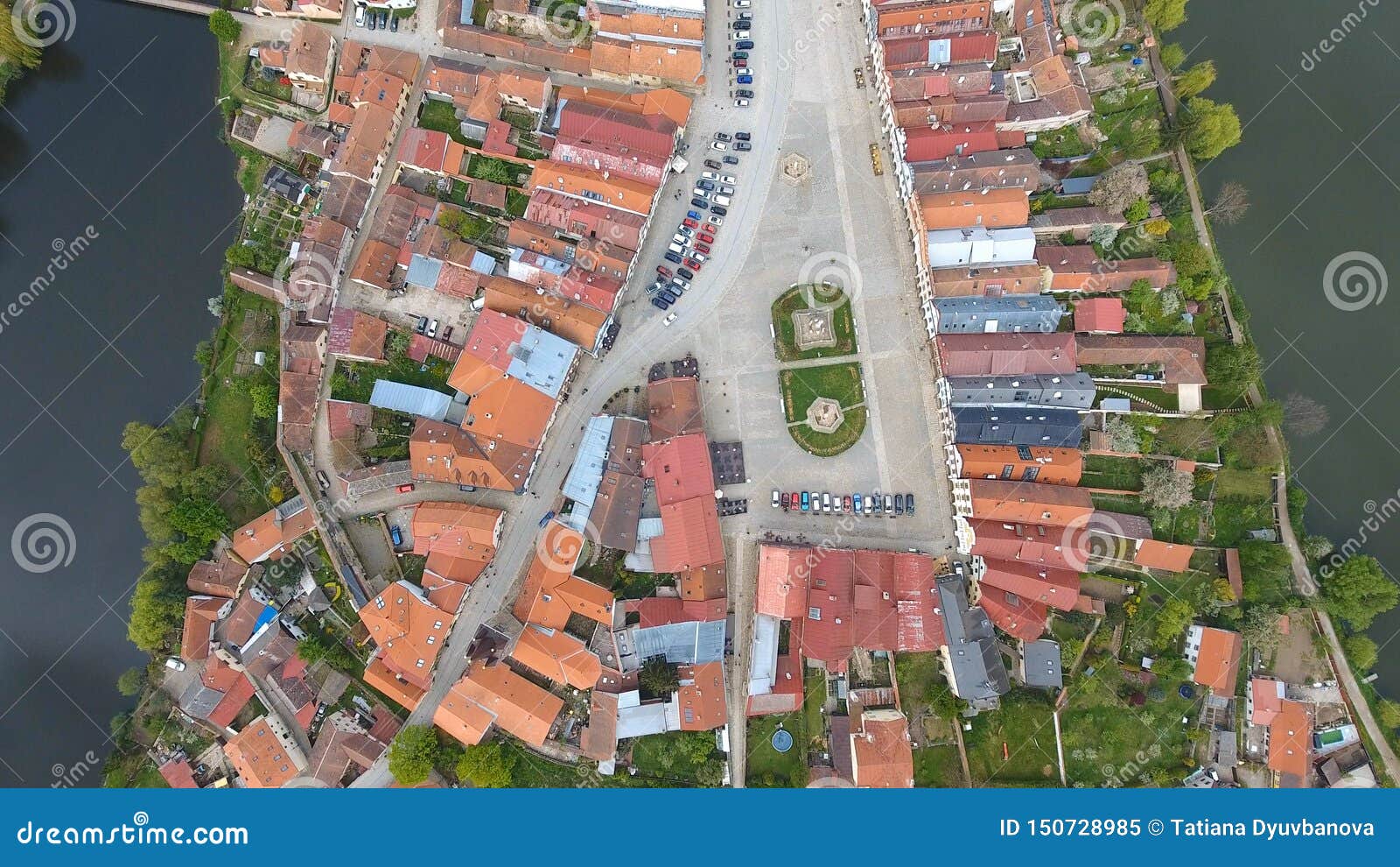 Aerial View Of Buildings With Red Tile Roofs On Medieval Square And Old