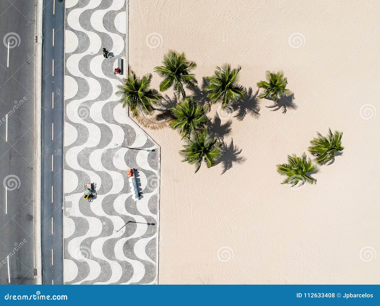 aerial view of copacabana beach during summer, sun with clouds.