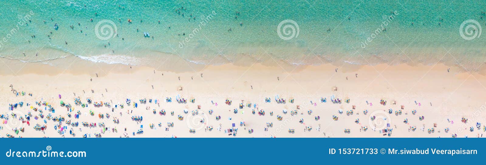 aerial view crowded public beach with colourful umbrellas, aerial view of sandy beach with tourists swimming in beautiful clear