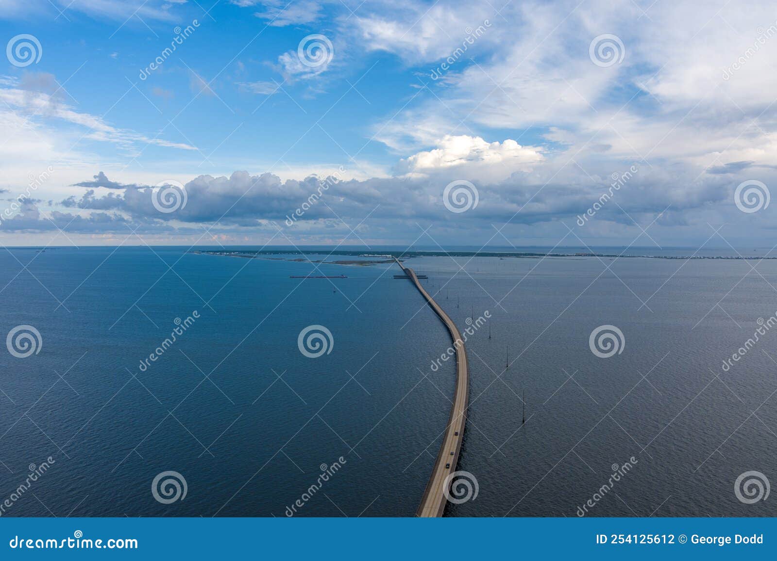 aerial view of the dauphin island bridge and mobile bay in august 2022