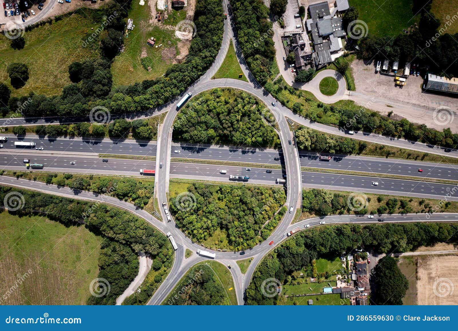 aerial view directly above an overbridge roundabout motorway junction