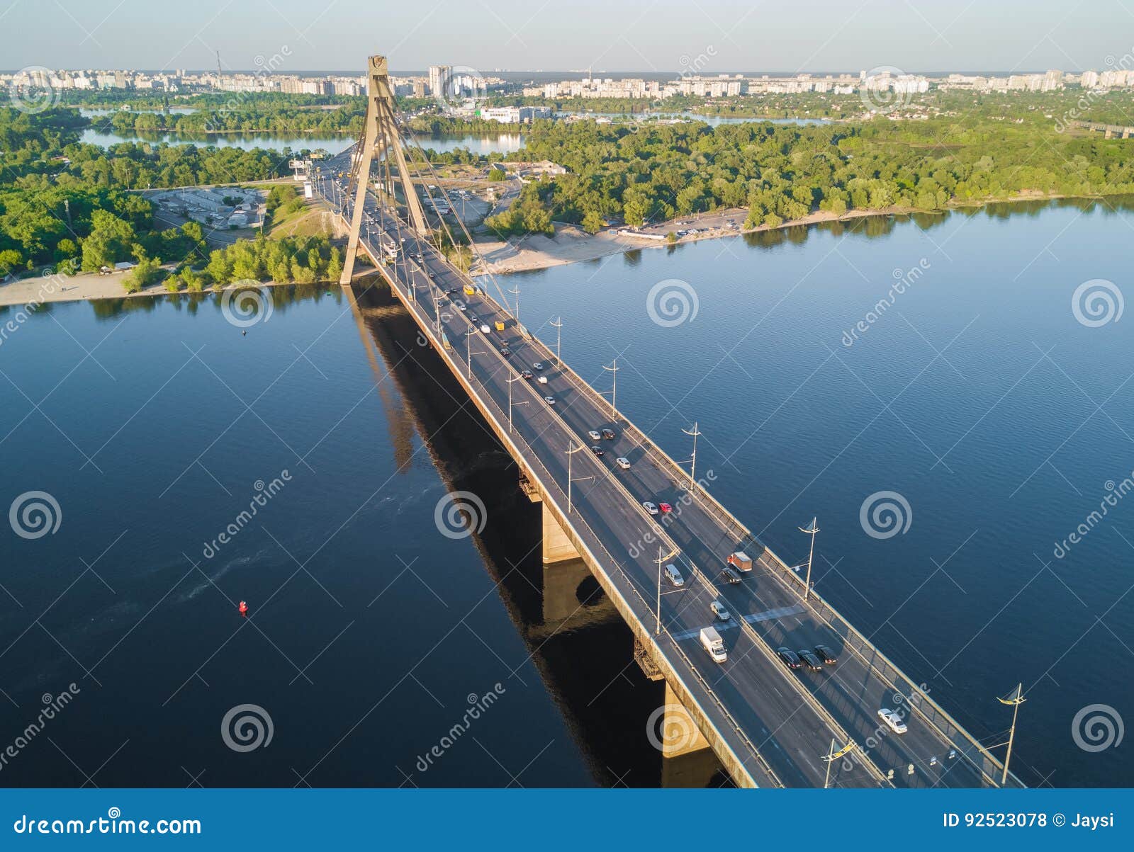 aerial view of dnipro river and moskovskiy bridge in kyiv, ukraine