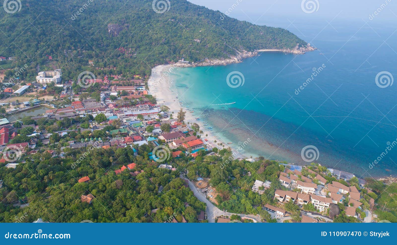 aerial view from the drone on the sand beach of haad rin, koh phangan island